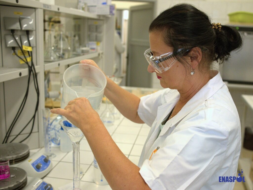 ENASPOL technologist providing direct technical support and surfactant analysis in the laboratory.